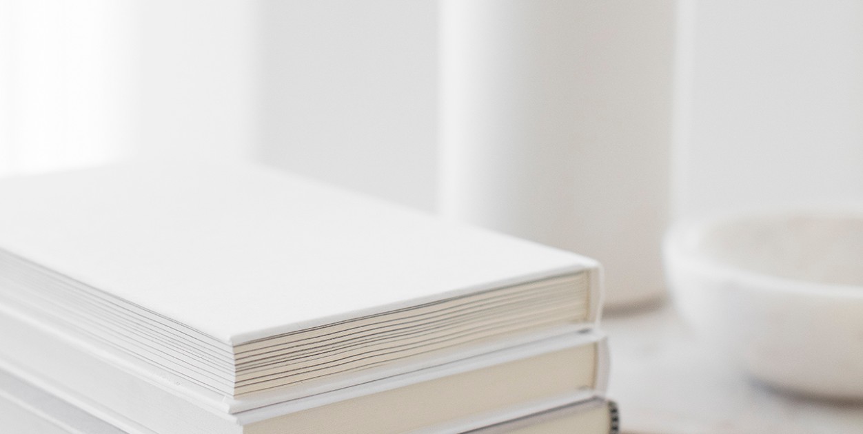 Stack of white notebooks