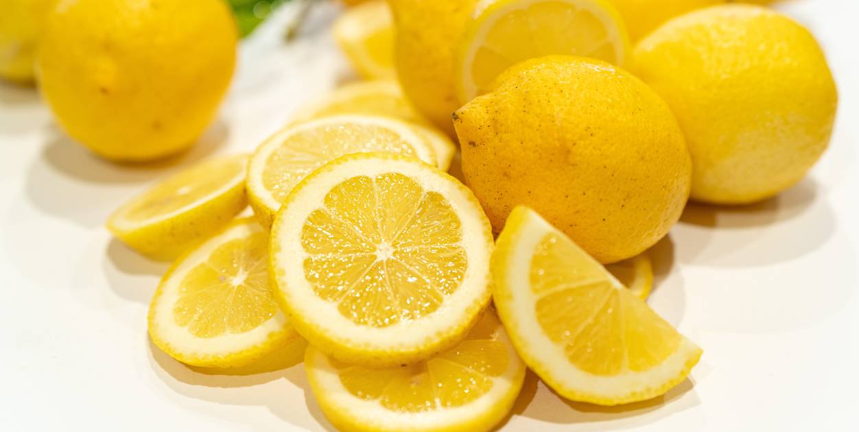 Yellow lemons on white background