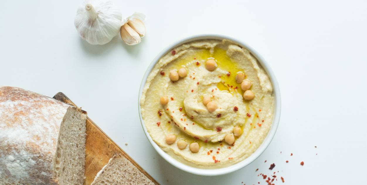 Bowl of hummus with bread